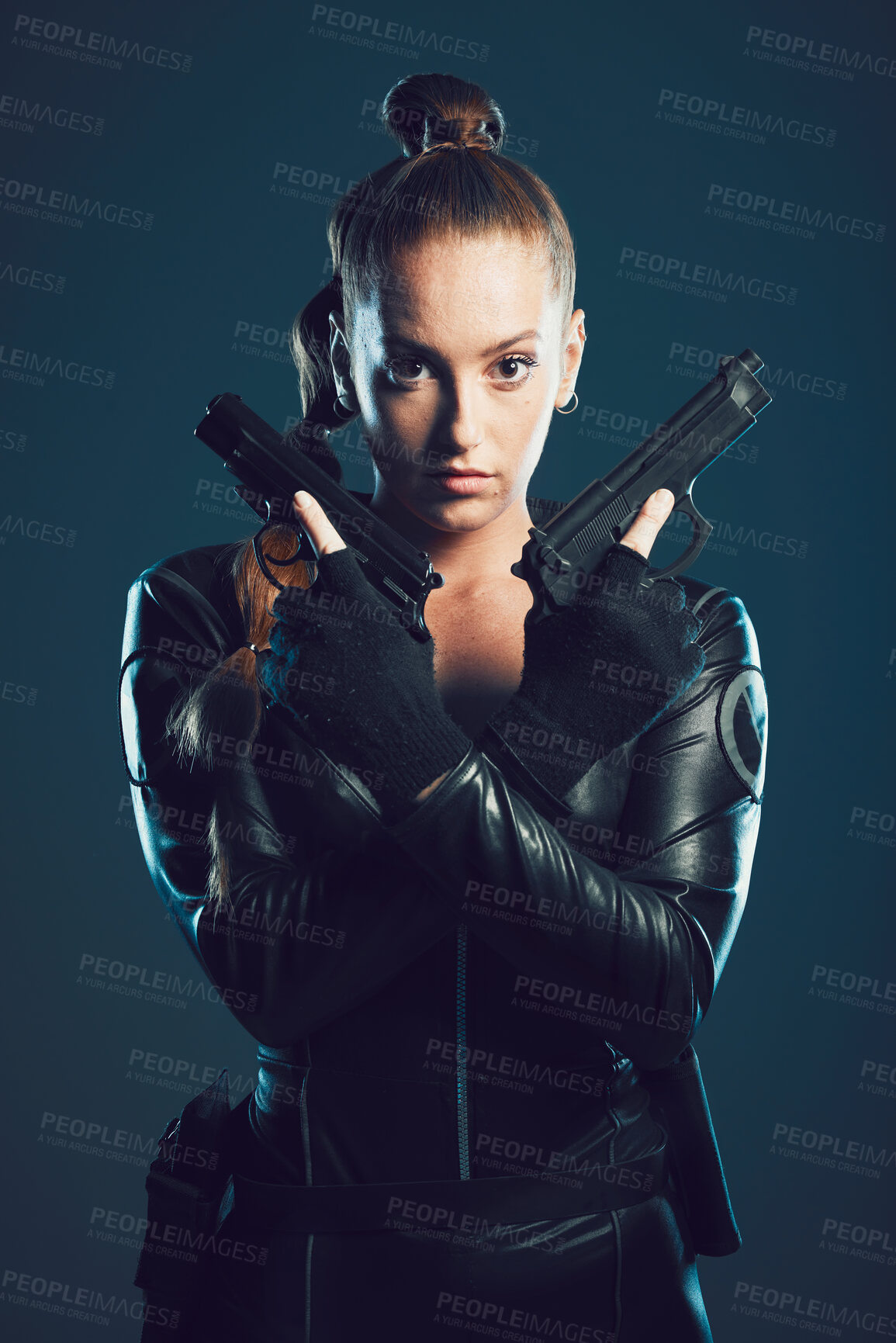 Buy stock photo Woman, gun and assassin in studio portrait for costume, action or cyberpunk clothes. Girl, pistol and leather fashion for crime, gangster and futuristic spy with danger or future aesthetic with ninja