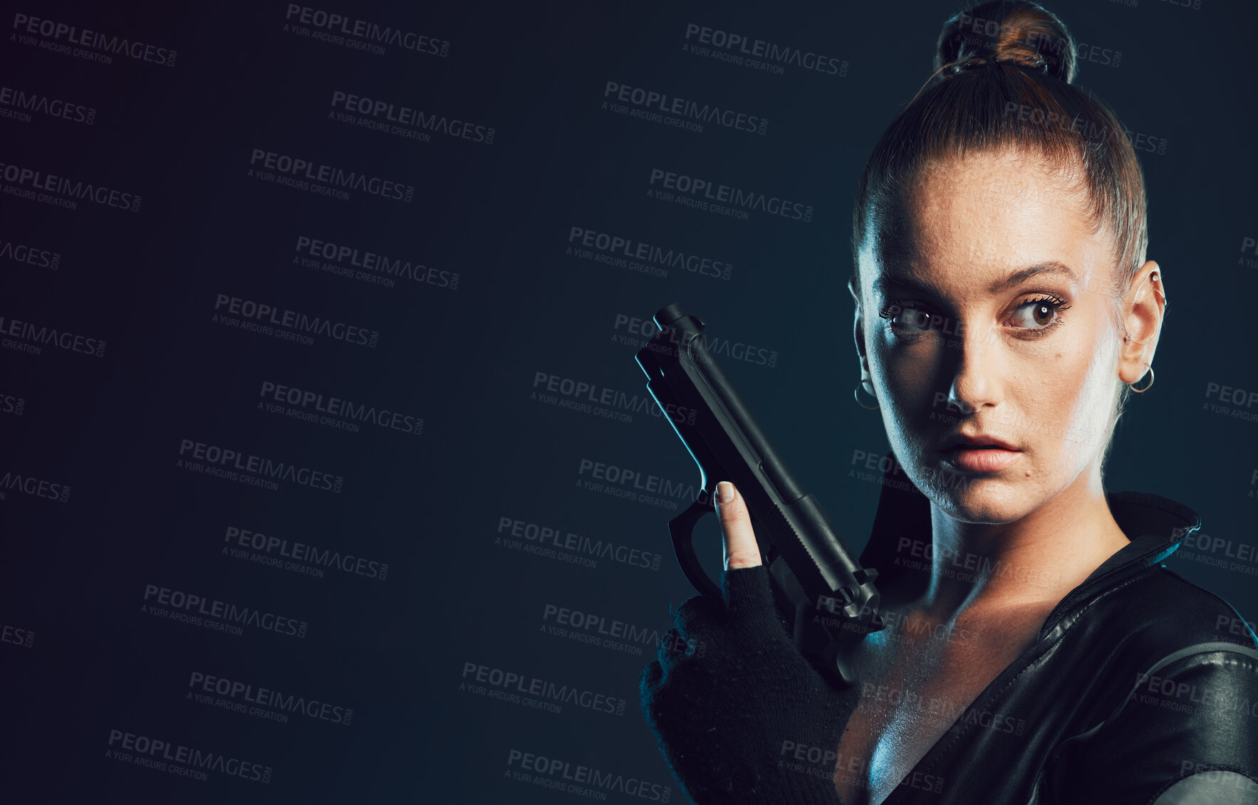 Buy stock photo Woman, vigilante and gun in serious war, battle or agent standing ready for mission on mockup. Female spy holding weapon for secret operation, objective or cosplay against a dark studio background