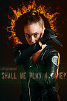 Woman, warrior and vigilante in cosplay with dagger ready for battle, war or game against a dark studio background. Portrait of serious female in black costume with knife in halloween or hunger games