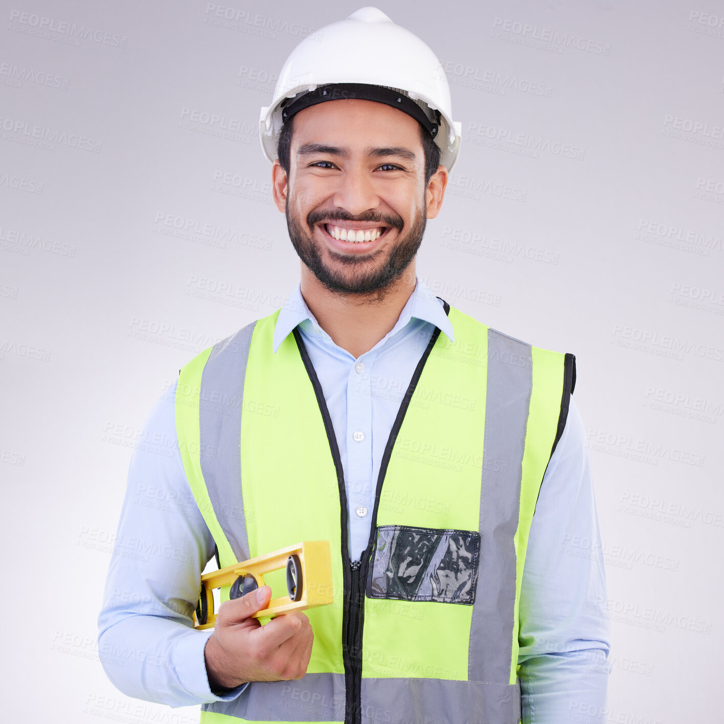 Buy stock photo Construction worker in portrait, man with tools and smile, architect or engineer in building industry on studio background. Happy male contractor, mockup and professional builder with helmet 