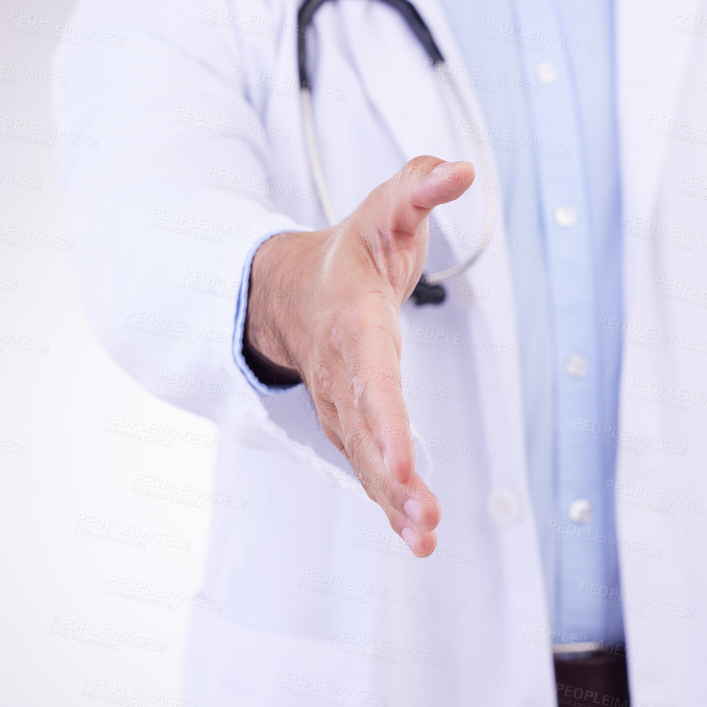 Buy stock photo Doctor, man and handshake for healthcare partnership, meeting or greeting against a white studio background. Hand of isolated male medical professional shaking hands for introduction or thank you