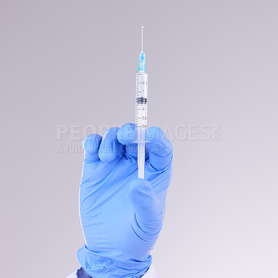 Buy stock photo Hands, vaccine and healthcare with a doctor in studio on a gray background holding monkeypox treatment. Medical, innovation and insurance with a medicine professional ready to administer a cure