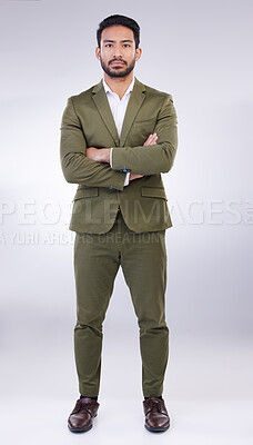 Buy stock photo Serious, business man and portrait of arms crossed in studio, white background and professional worker. Focused entrepreneur, male model and leadership in suit, corporate power and assertive attitude