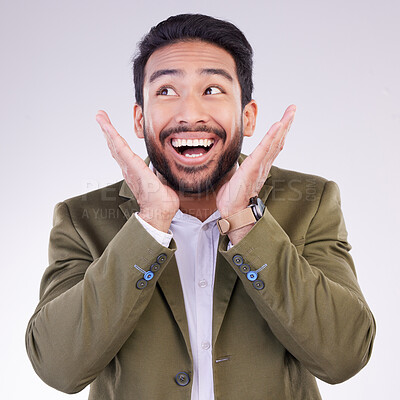 Buy stock photo Happy, excited and young businessman in a studio with wow, omg or wtf face expression. Happiness, surprise and corporate male model from India with a shock or amazed facial gesture by gray background