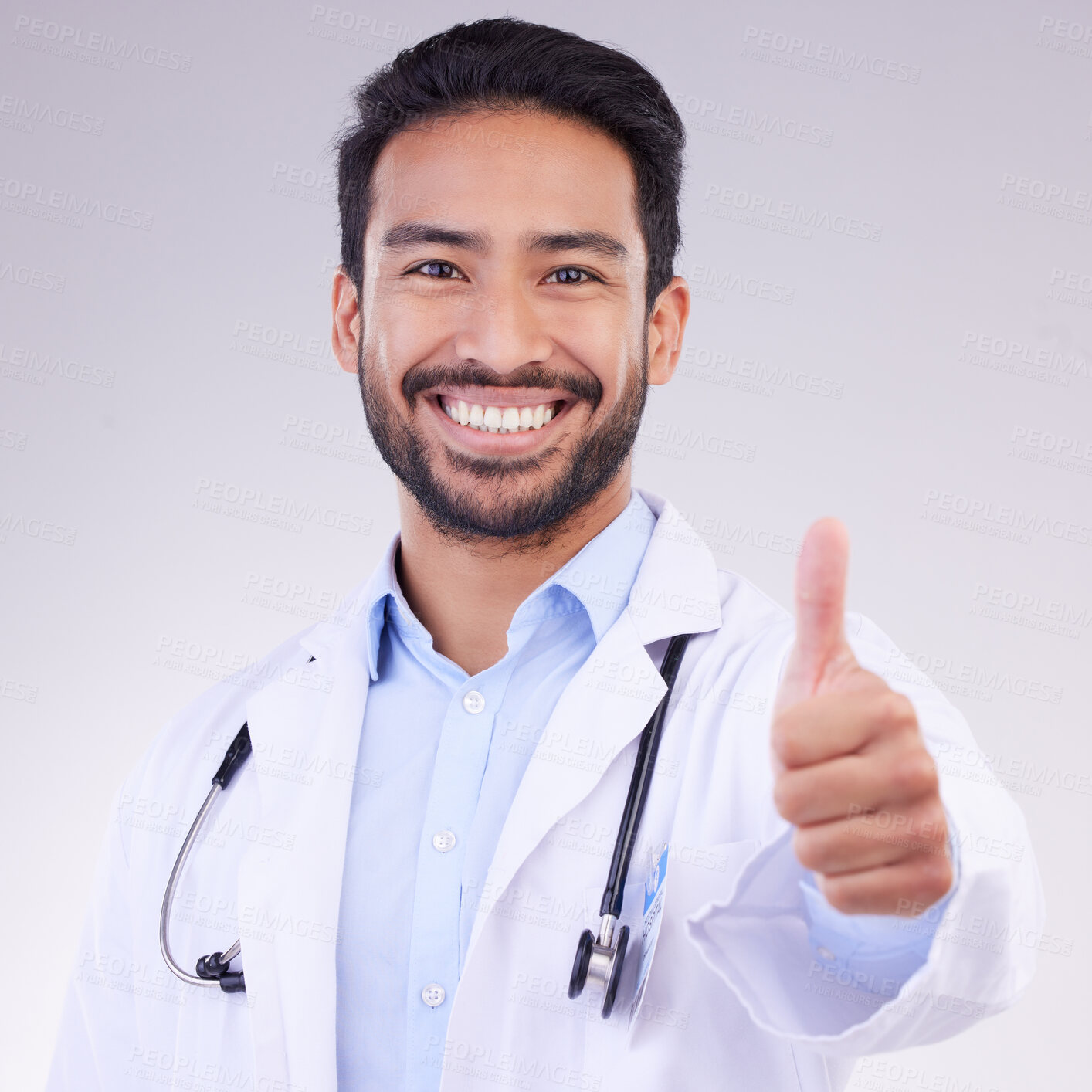 Buy stock photo Portrait of man doctor thumbs up isolated on a white background support, thank you and healthcare services goals. Medical asian professional in like, agreement or success hand sign or emoji in studio