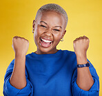 Portrait, happy black woman and fist of winner in studio for celebration, achievement deal and success. Excited female model celebrate winning achievement on background for lottery, victory and smile