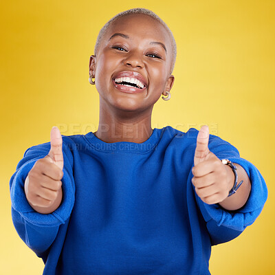 Buy stock photo Laughing, portrait and black woman with thumbs up in studio isolated on a yellow background. Happy, emoji face and funny female with hand gesture for agreement, support or approval, like or success.