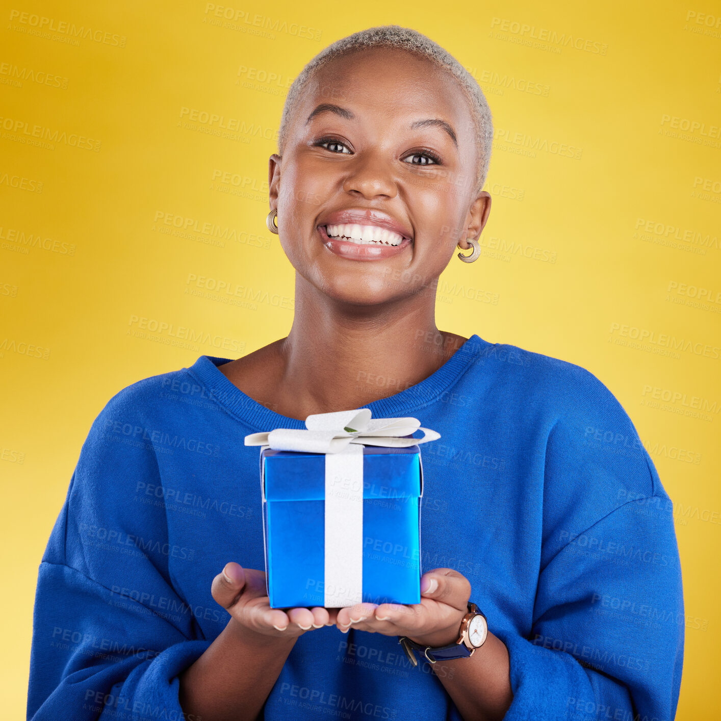 Buy stock photo Portrait, smile and black woman with birthday gift in studio isolated on a yellow background. Face, box and happy African female with present for celebration, party and holiday for special event.