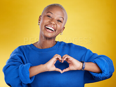 Buy stock photo Heart hands, portrait and happy black woman in studio, background and color backdrop for emoji. Smile, female model and finger shape for love, thank you and support of peace, care or sign of kindness