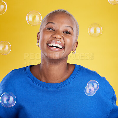 Buy stock photo Black woman, studio portrait and soap bubbles for student smile, happiness or beauty by yellow background. Happy girl, model or fashion with excited face, cosmetics or gen z aesthetic with confidence