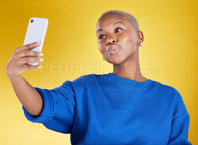 Buy stock photo Selfie, smile and beauty of black woman in studio isolated on a yellow background. Photographer, social media and African female model taking pictures or photo for profile picture and happy memory.