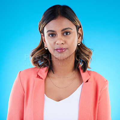 Buy stock photo Face, portrait and business woman in studio isolated on a blue background with pride for career, profession or job. Boss, professional and confident, serious and proud female entrepreneur from India.