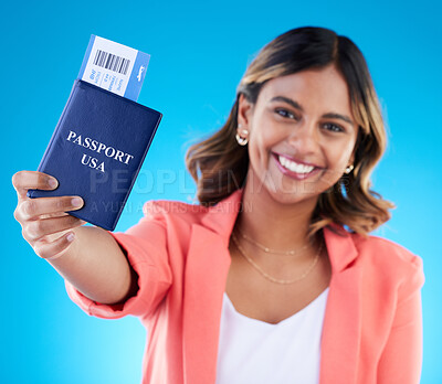 Buy stock photo Happy woman face show passport isolated on blue background for USA travel opportunity, immigration or holiday. Identity document, flight ticket and excited portrait of young indian person in studio