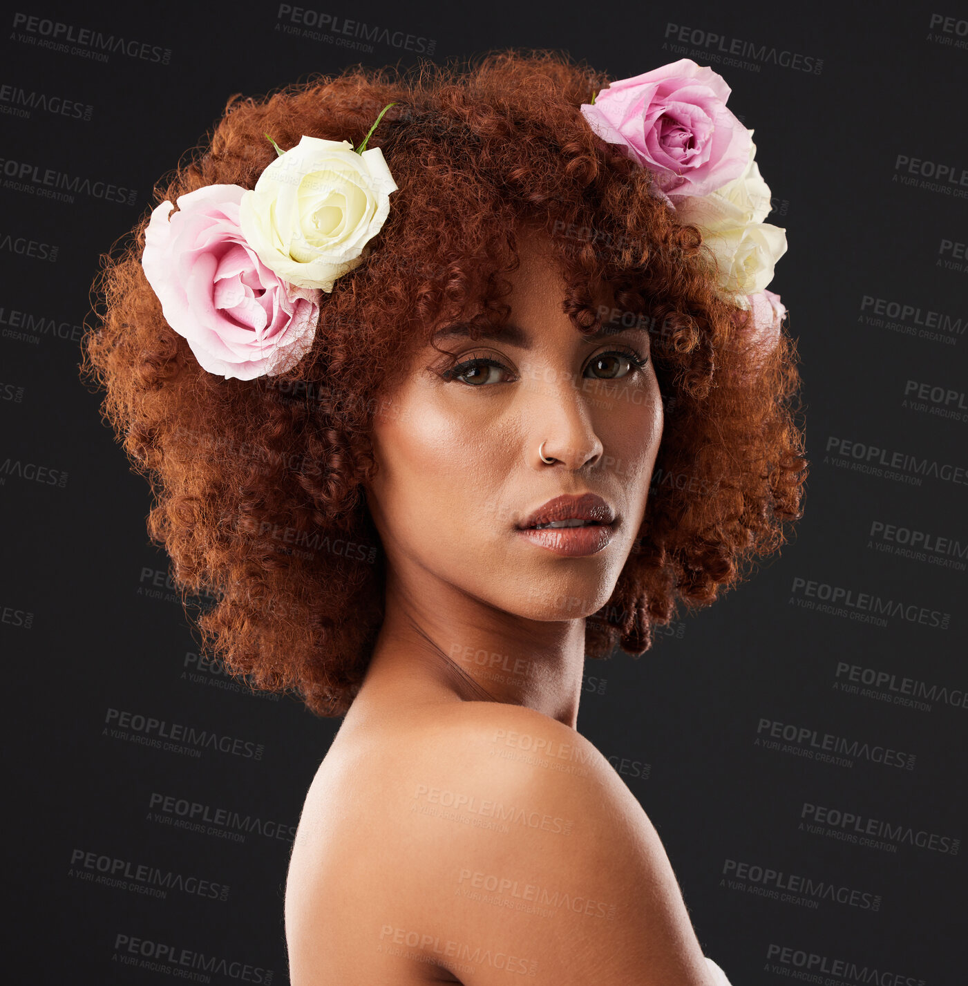 Buy stock photo Face, beauty and flowers with a model black woman in studio on a dark background for natural skincare. Wellness, luxury and portrait with an attractive young female wearing a flower crown or wreath