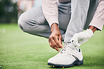 Closeup, golf and man tie shoelace, fitness and success with game, playing and workout outdoor. Male athlete, guy and player, tying laces and training for match, competition and sports for wellness