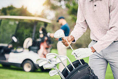Golf, club and man with golfing bag ready to start game, practice and training for competition. Professional golfer, activity and hands of male caddy with clubs for exercise, fitness and recreation