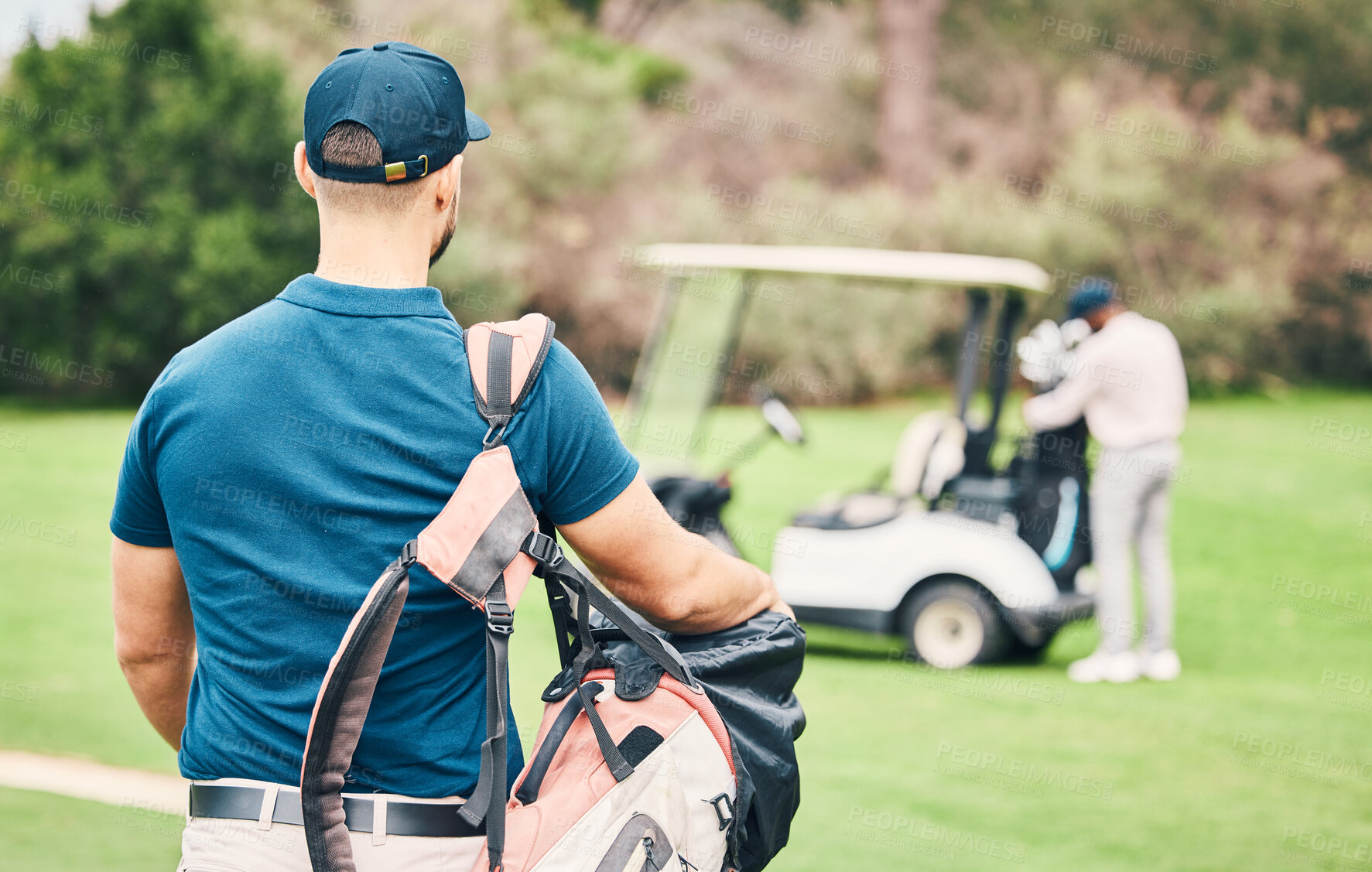 Buy stock photo Golf, sports and back of man on course with golfing bag of clubs ready to start game, practice and training on lawn. Professional golfer, activity and male caddy for exercise, fitness and recreation
