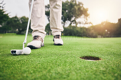 Buy stock photo Golf, closeup and golfer or player hit ball and professional athlete training and putting on a filed as exercise or workout. Feet, equipment and gentleman or person relax and playing a sport