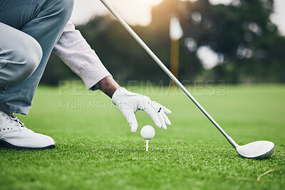 Training, golf ball and tee with hand of black man on field for sports, tournament and challenge. Start, competition match and ready with athlete and club on course for action, games and hobby