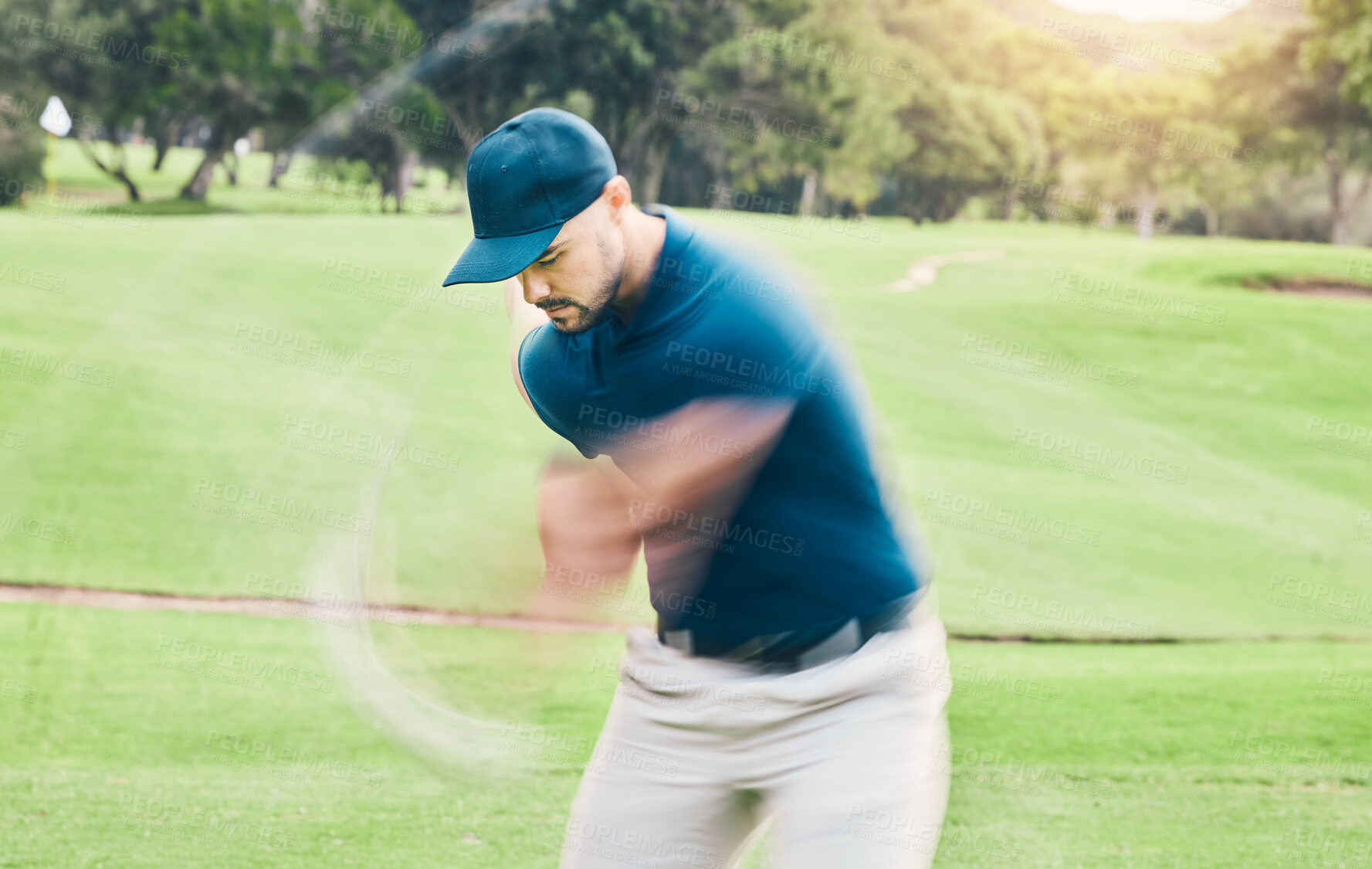 Buy stock photo Golf, motion blur and hobby with a sports man swinging a club on a field or course for recreation and fun. Golfing, grass and training with a male golfer playing a game on a green during summer