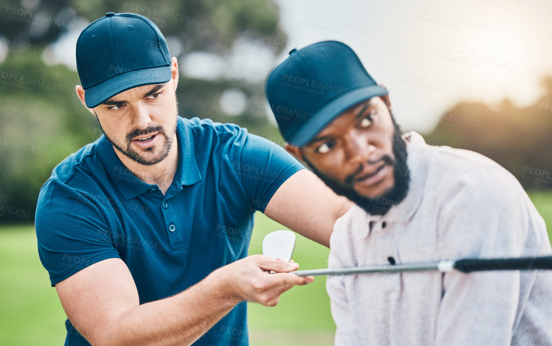 Buy stock photo Teaching, lesson and men playing golf, learning good form and sports hobby. Help, instructor and a black man with a coach for professional sport training, physical activity and golfing on a course