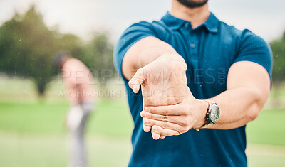 Golf, sports and man stretching hand on course for game, practice and training for competition. Professional golfer, fitness and hands of male athlete warm up for exercise, golfing and recreation