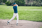 Golf stroke, sport and golfer outdoor for game, fitness and exercise on grass with a swing. Athlete, training and man at a sports club for cardio and workout on a green course with focus and action