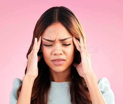 Buy stock photo Stress, anxiety and depression, woman with headache in studio, tired and exhausted on pink background. Mental health, burnout and depressed hispanic model with hand on head in pain and temple massage