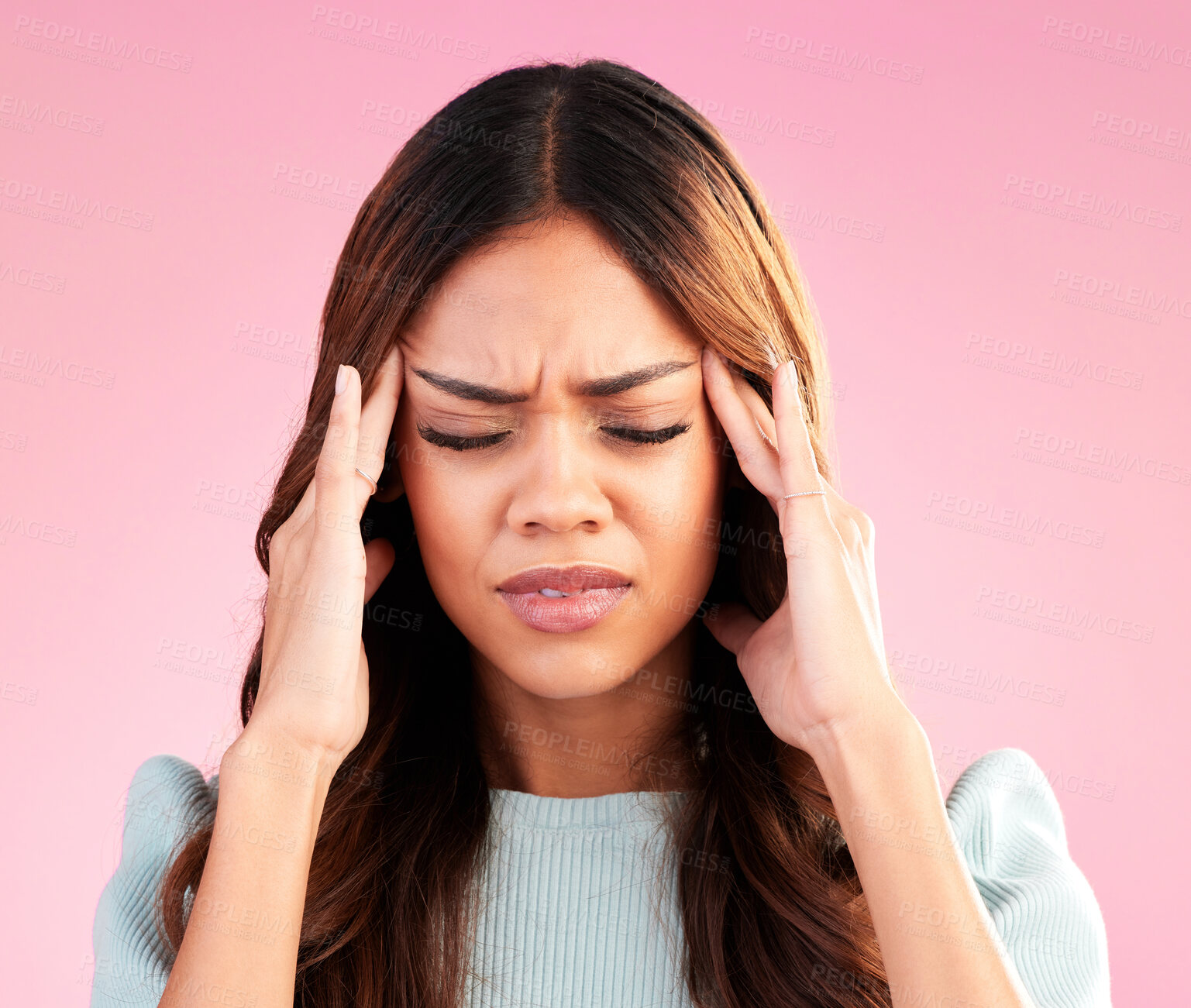 Buy stock photo Stress, anxiety and depression, woman with headache in studio, tired and exhausted on pink background. Mental health, burnout and depressed hispanic model with hand on head in pain and temple massage