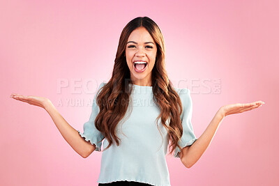 Buy stock photo Happy woman, marketing and smile in portrait with hands out, branding and product placement with promo on pink background. Advertising, logo and brand, mockup space and female with display in studio