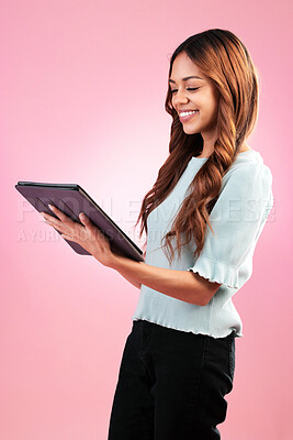Buy stock photo Search, digital table and business woman in studio happy, smile and confident while checking schedule on pink background. Internet, creative and lady entrepreneur online for review, kpi or analysis 