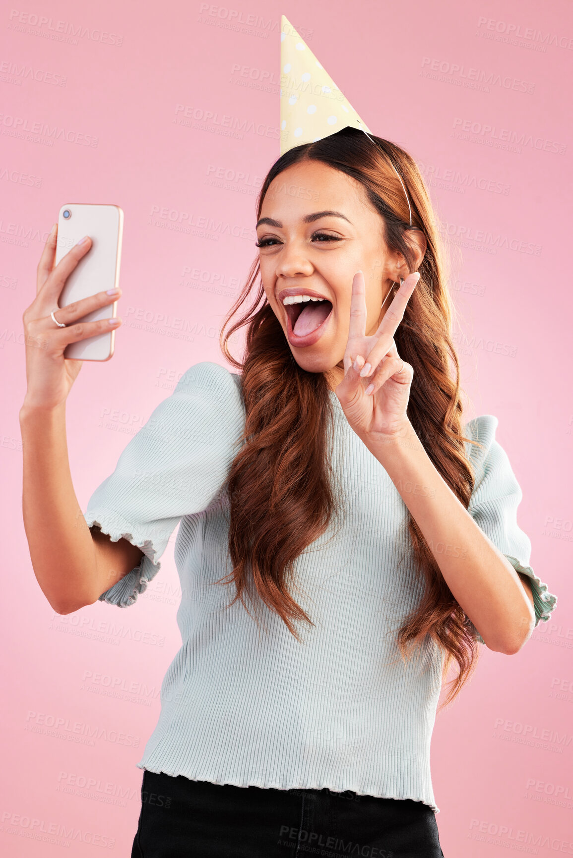 Buy stock photo Peace sign, selfie and birthday of happy woman in studio isolated on a pink background. V hand emoji, profile picture and excited female taking photo for memory, social media and party celebration.