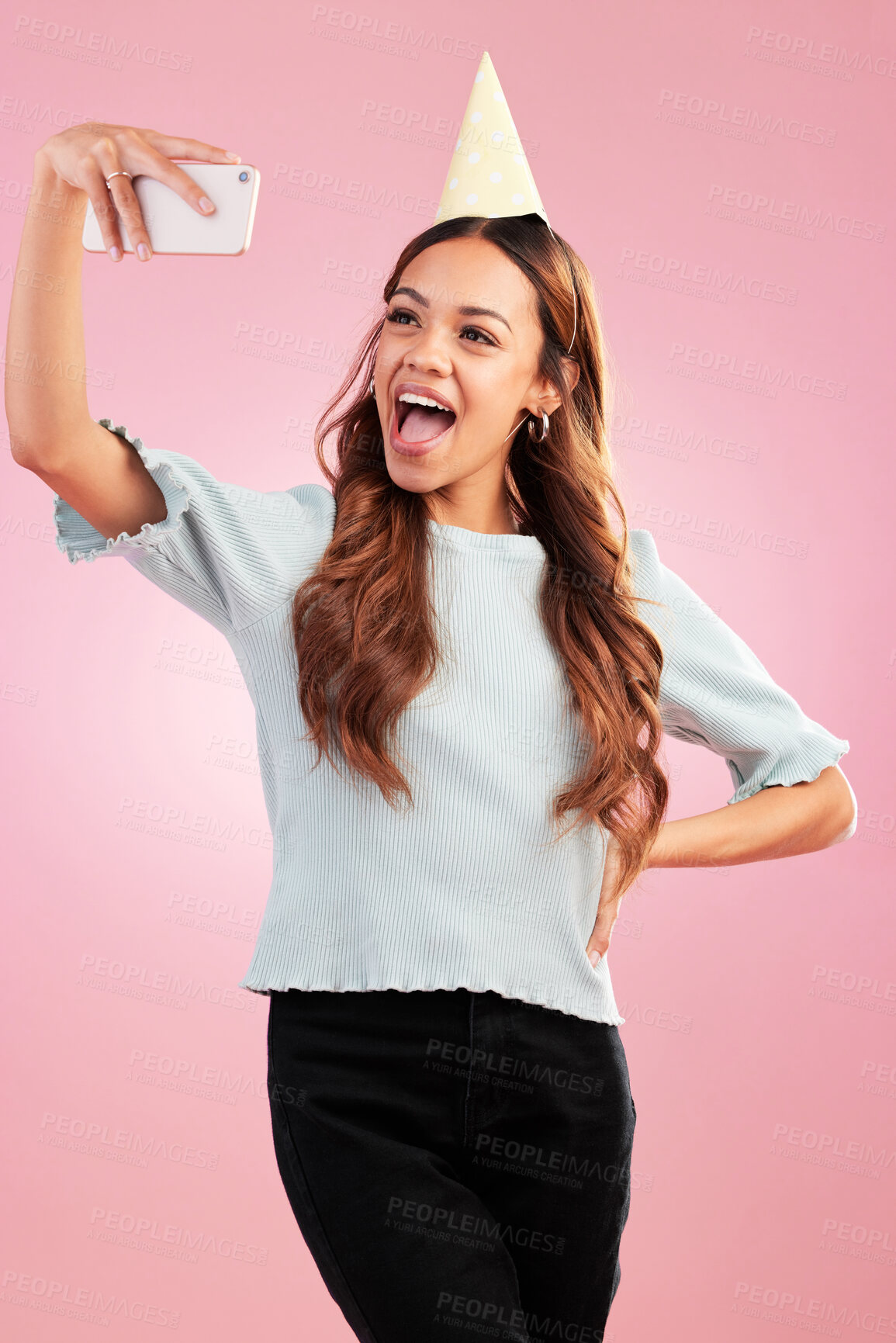 Buy stock photo Birthday, selfie and social media with a woman in studio on a pink background for the celebration of an event. Phone, excited and party with an attractive young female celebrating a special occasion