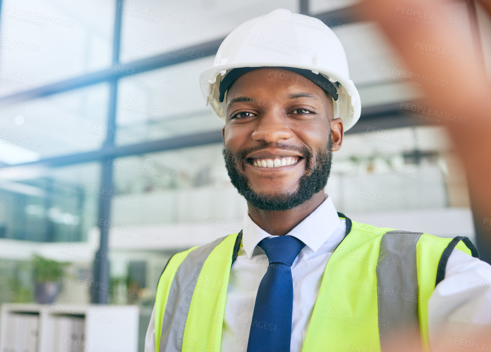 Buy stock photo Black man, construction or engineer selfie with a smile working in office for project management. Face of a male person working in building or engineering industry with pride for career and vision 