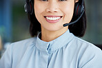 Asian woman, call center employee and smile with face, communication and CRM, headset with mic and closeup. Contact us, customer service or telemarketing, happy female consultant and help desk