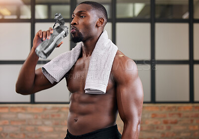 Buy stock photo Shirtless bodybuilder, black man and drinking water in gym for health, break and energy of workout, training or diet. Thirsty male, abs and bottle for fitness nutrition, hydration and sports wellness