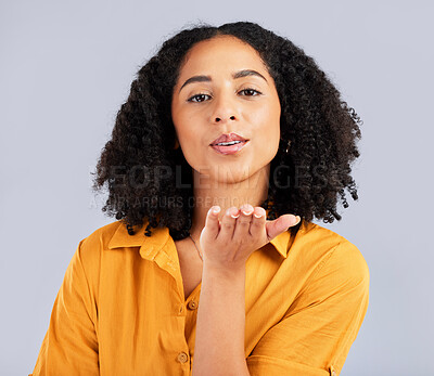 Buy stock photo Flirty, happy and a portrait of a woman blowing kiss isolated on a studio background. Love, smile and a flirtatious girl with a loving, cute and romantic gesture on a backdrop for expression