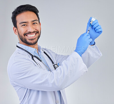 Buy stock photo Covid, vaccine and portrait of doctor in studio, happy and smile for medicine, breakthrough or cure on grey background. Medical, innovation and face of male corona expert with futuristic treatment
