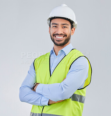 Buy stock photo Construction worker, engineer and studio portrait of happy man in vest and helmet for safety on white background. Smile, contractor or architect in planning or renovation, project manager in India.