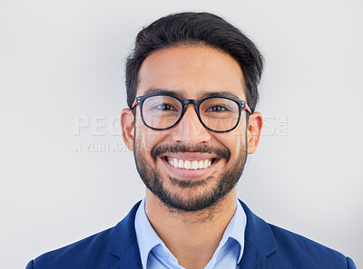 Buy stock photo Happy, portrait and excited businessman in studio, smile and confident against a grey background space. Face, happiness and young mexican entrepreneur posing empowered, professional and handsome 