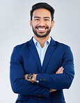 Business man, smile and arms crossed portrait in studio for corporate or CEO fashion while happy. Face of asian entrepreneur person isolated white background with pride for luxury, success and wealth