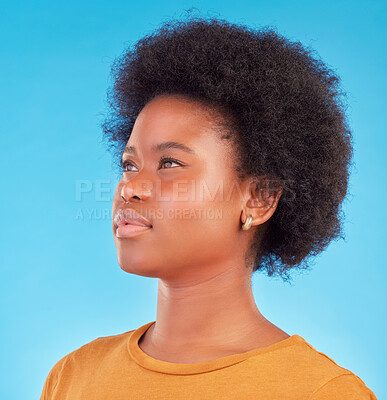 Buy stock photo Thinking, idea and black woman wondering looking away in thought isolated against a blue studio background. Afro, casual and face of young African American female relax, calm and confident
