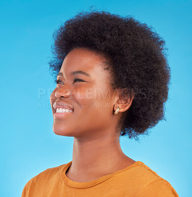Buy stock photo Thinking, smile and happy black woman wondering looking away in thought isolated against a blue studio background. Afro, casual and face of young African American female relax, calm and confident