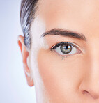 Closeup, portrait and woman with skincare, cosmetics and dermatology against a studio background. Face, female and lady with grooming, zoom and treatment with natural care, eye and morning routine