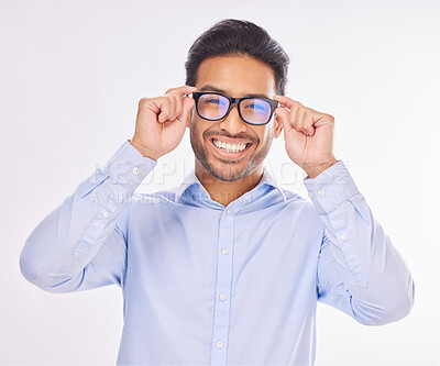 Buy stock photo Portrait, vision and glasses with a man in studio on a white background to promote eye care optometry. Face, eyewear or eyesight with a handsome young male wearing new prescription frame spectacles