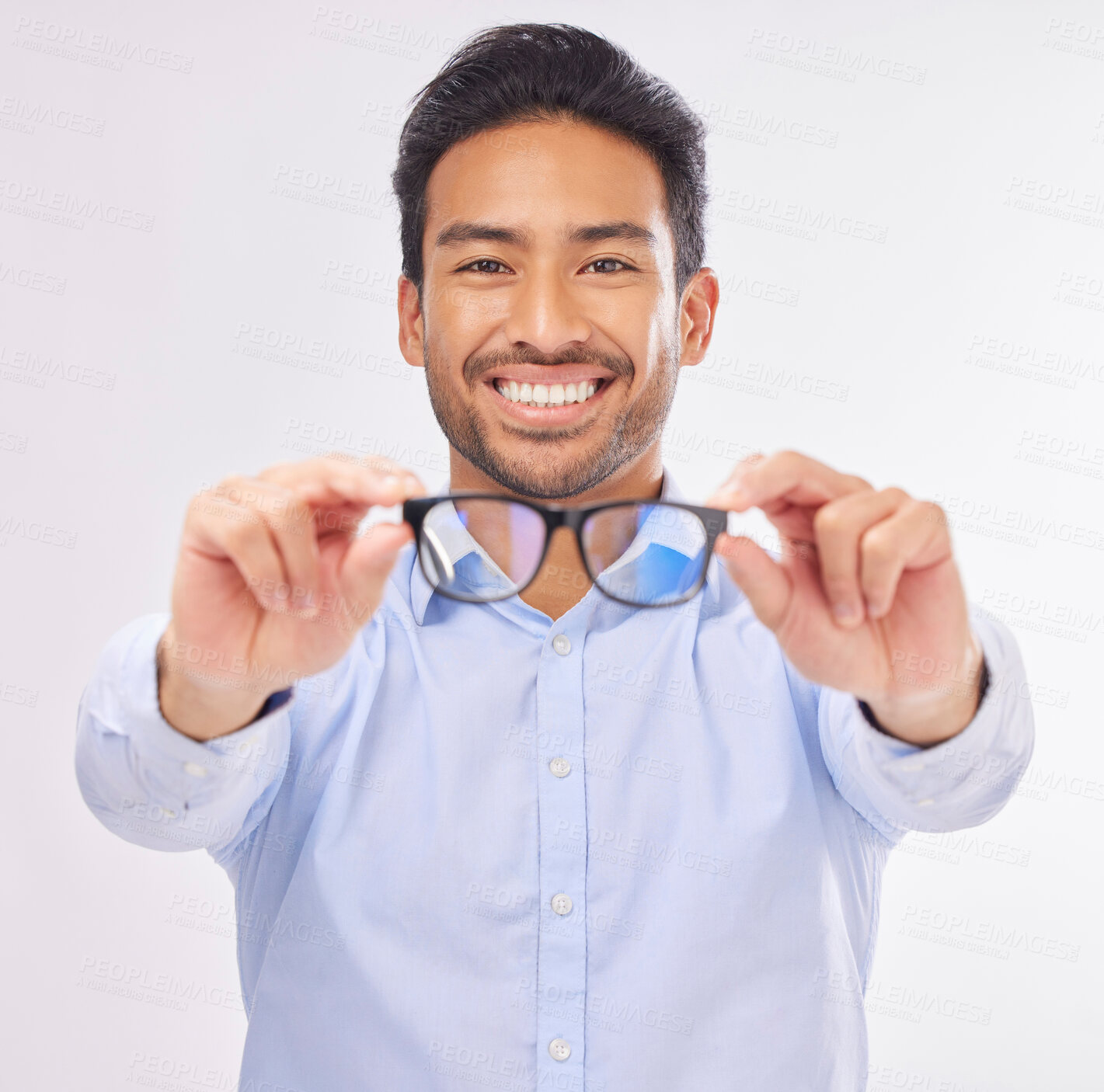 Buy stock photo Glasses, vision portrait and man happy in studio for eye care, lens or frame isolated on a white background. Smile of asian male model show optometry eyewear brand in hands to check eyesight or focus