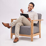 Psychologist, doctor and mental health, man with smile in portrait and clipboard for medical checklist on studio background. Sitting on chair, therapy and happy male with advice, help and psychology