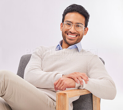 Buy stock photo Vision, chair and portrait of businessman for optometry sitting happy with a smile and confident isolated in studio white background. Glasses on face of professional male employee or entrepreneur