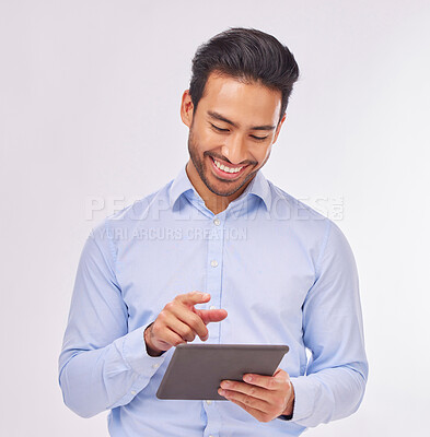 Buy stock photo Typing, smile and business man with tablet in studio isolated on a white background. Professional, technology and happy male with touch screen for social media, research or internet browsing online.