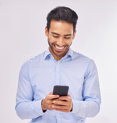 Buy stock photo Smile, phone and business man typing in studio isolated on a white background. Cellphone, web networking and happy male professional with smartphone for reading, social media or mobile app online.